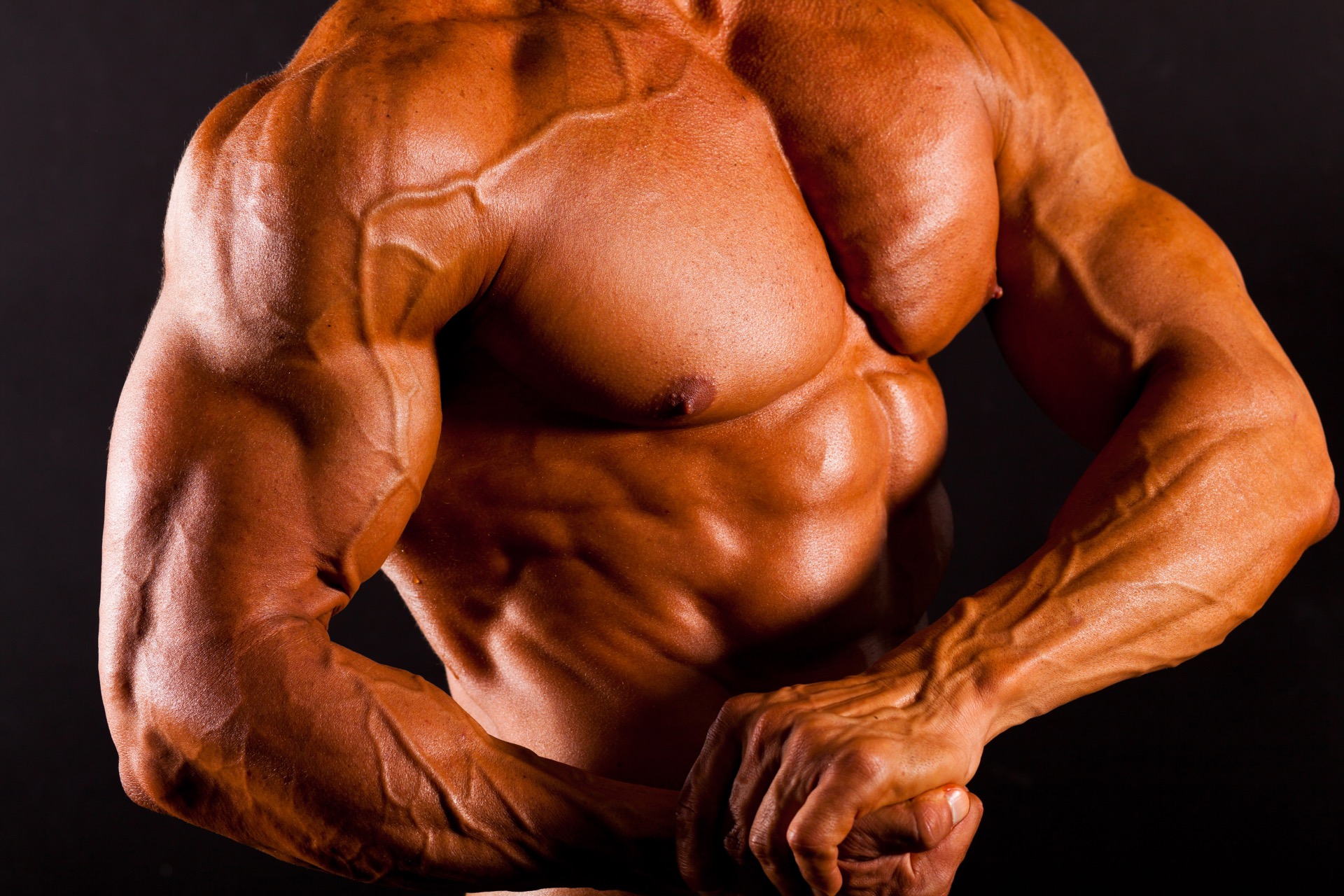 Накаченные мускулы. Мускулистый человек. Бодибилдинг мужчины. Сильный мышцы. Накаченные мышцы.